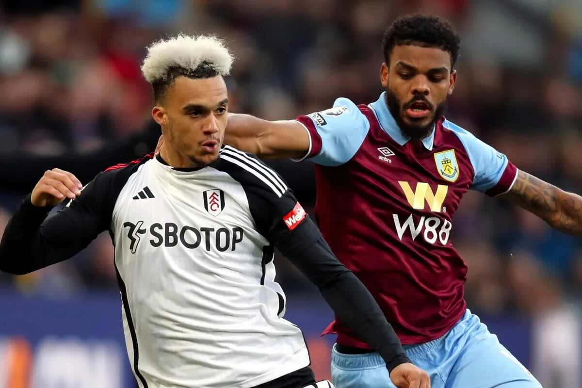 Burnley and Fulham players contesting possession during a Premier League match, showing the physical duels expected in Burnley vs Fulham