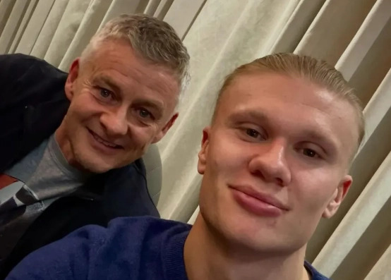Erling Haaland pictured with Ole Gunnar Solskjaer after posting "Knowledge" on Instagram
